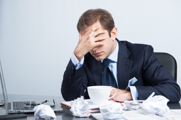 business man frustrated and smoking