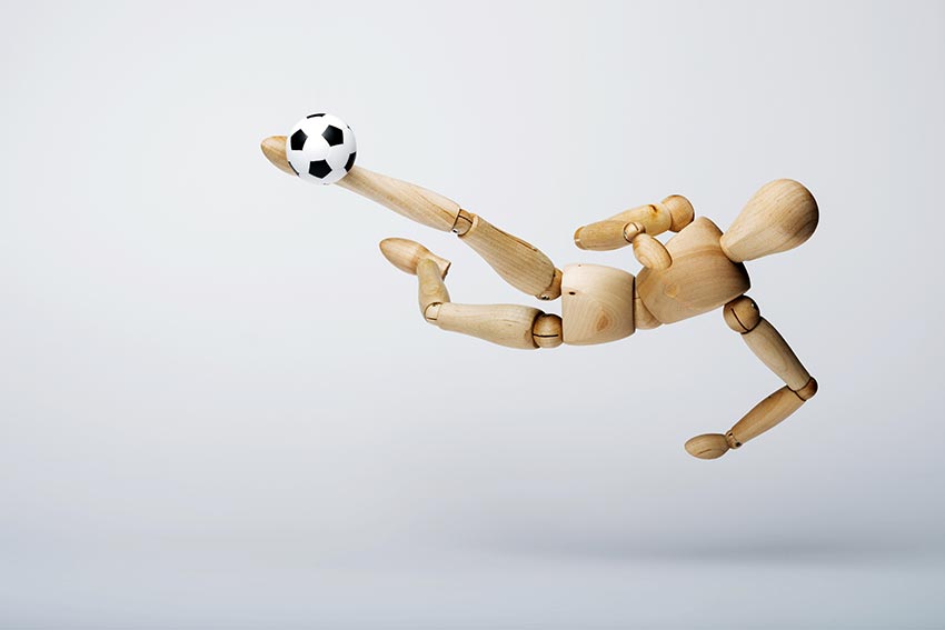 Figurine kicks soccer ball while getting past the gatekeeper scripts.