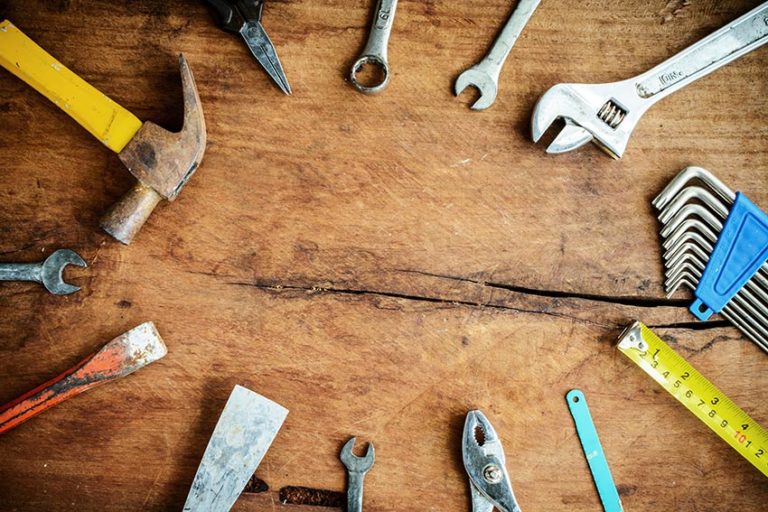 Tools on wood background