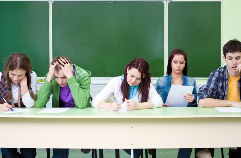 classroom students working in a row