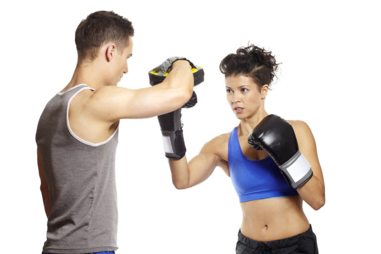 young man and woman sparring