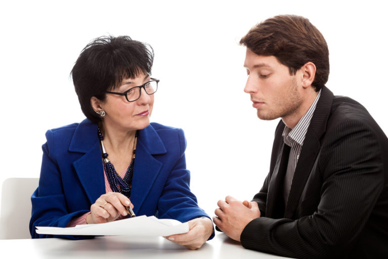 Elderly woman conducting meeting