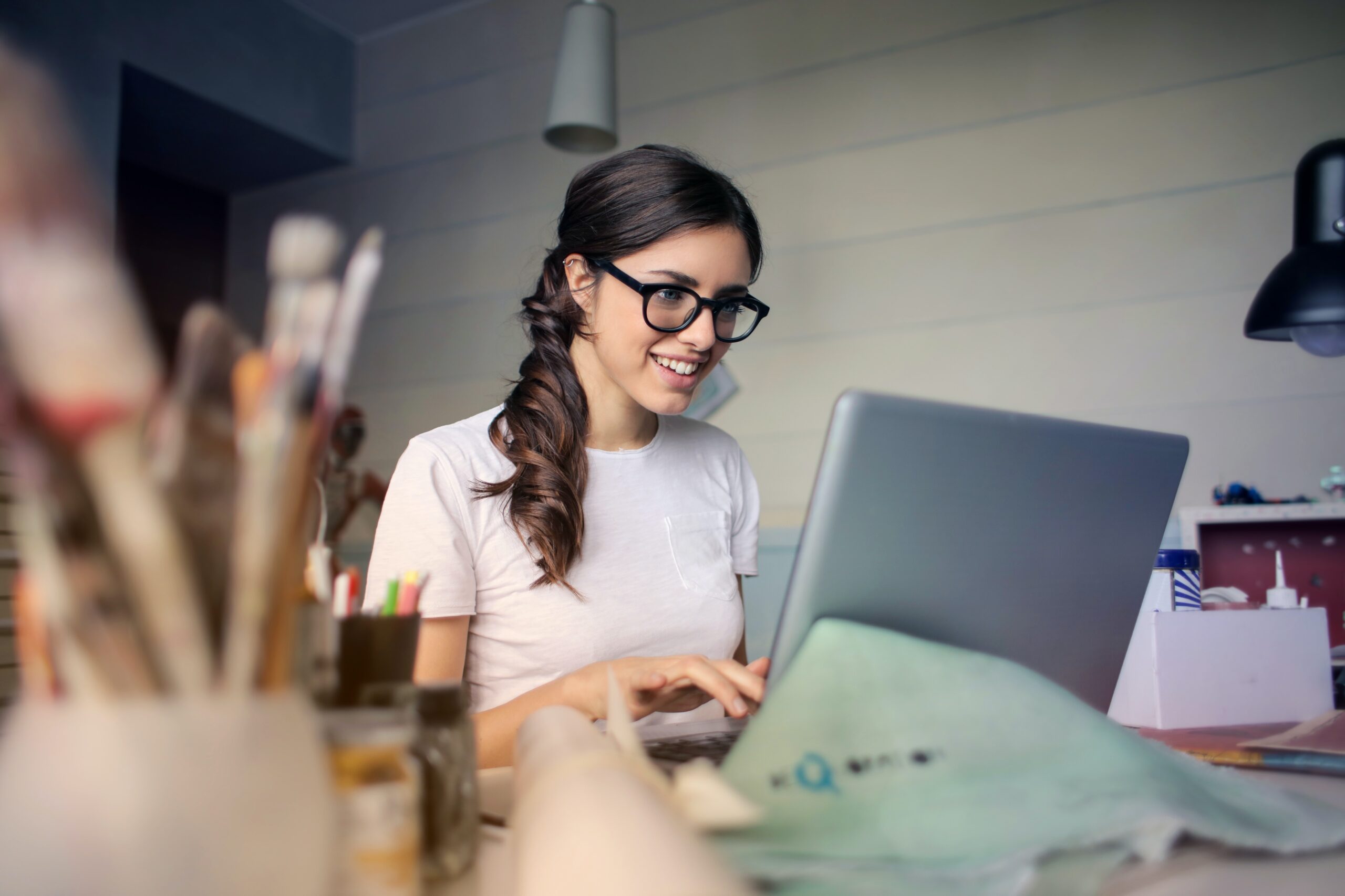 Young worker sitting at her desk